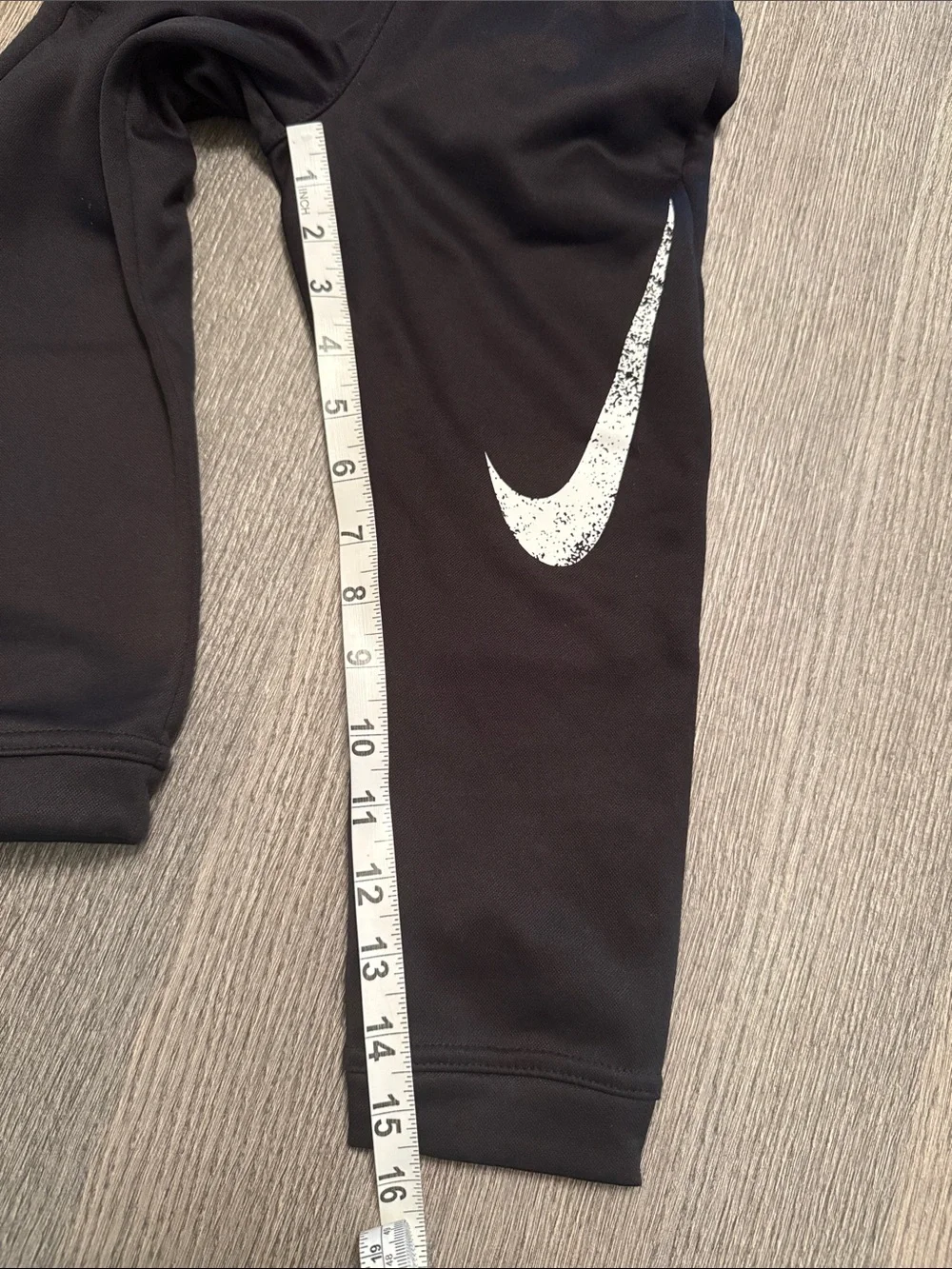 Nike Black Kids Sweatpants with White Swoosh Graphic